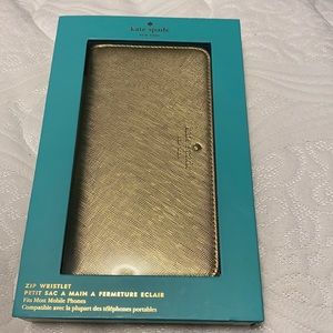 Gold Kate spade wristlet